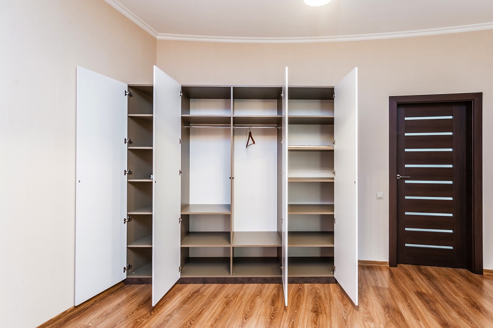 Modern hinged wardrobe with opened doors